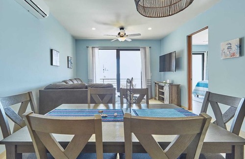 Cabo Bello Condo | New 2-bedroom, 2-bath condo at Vista Azul with Medano Beach and marina views. Enjoy a bright living space, spacious patio, shared BBQ and firepit, and a pool nearby. Just minutes from downtown—perfect for relaxing and exploring Cabo.