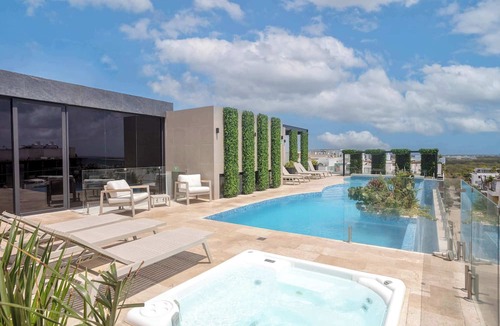 Zazil-ha Apartment | Heart of Playa 5th Ave: Ocean Views & Beach Access