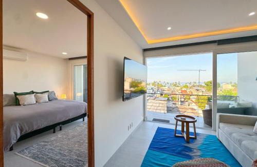Colonia 5 de Diciembre Apartment | VREDE - Modern Ocean View - Great Rooftop Amenities