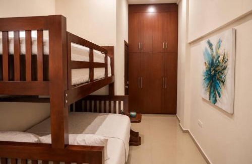 Ferrocarrilera Apartment | 2BR-3BA Condo Block from Beach w Rooftop Jacuzzi