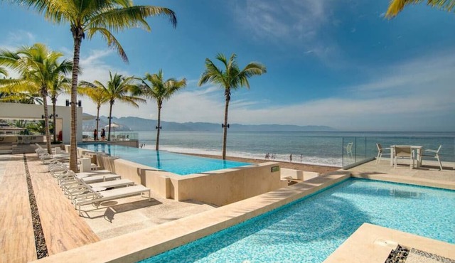 Harbor 3008 Amazing beach front romantic vacation home by Moikkarentals in Puerto Vallarta