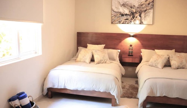 Luxury Condo Close to the beach,Tropical Setting,Garden Patio, Golf Club Nearby in Playa del Carmen